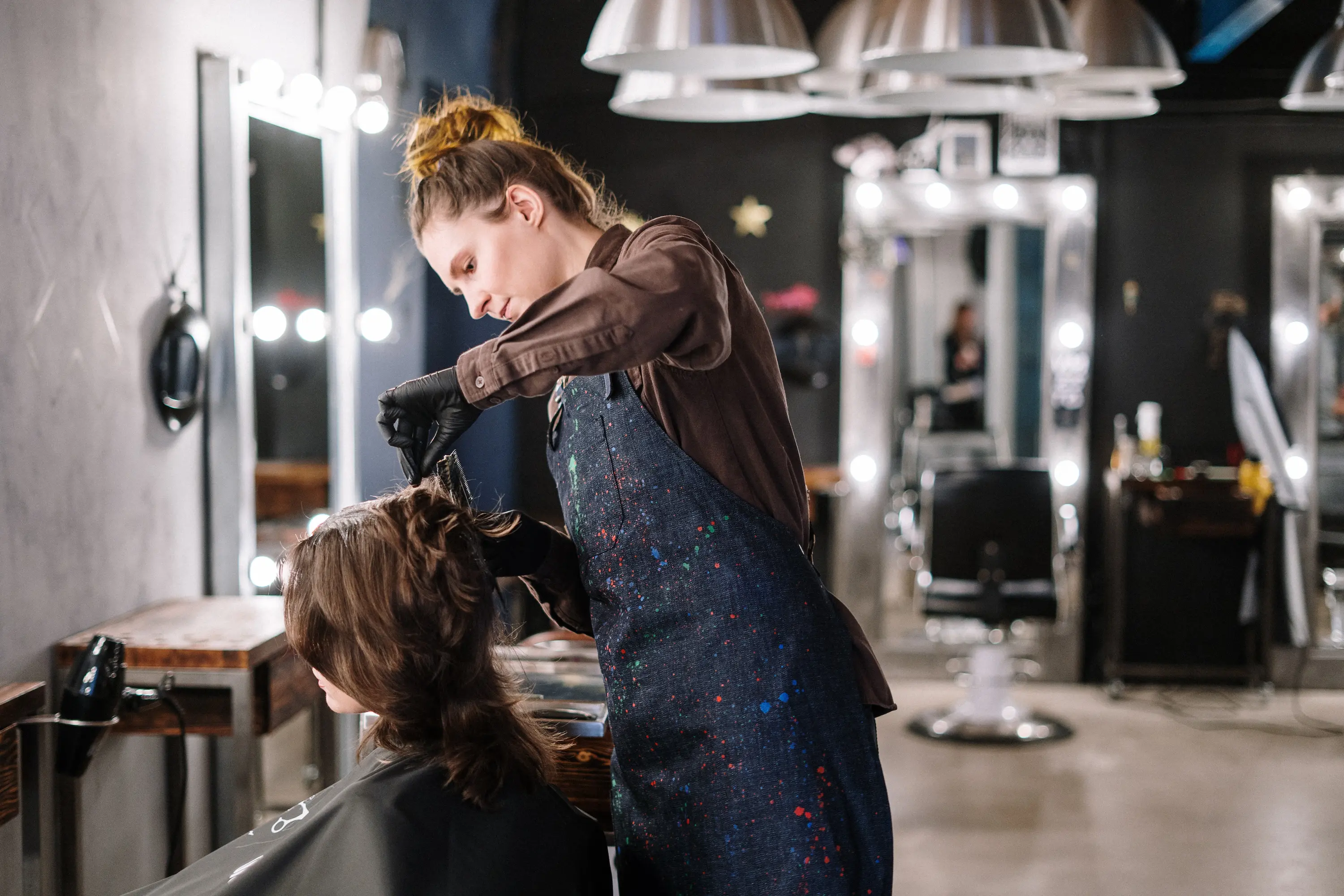 Hairdresser cutting someone's hair